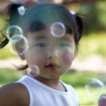 girl_blowing_bubbles photo