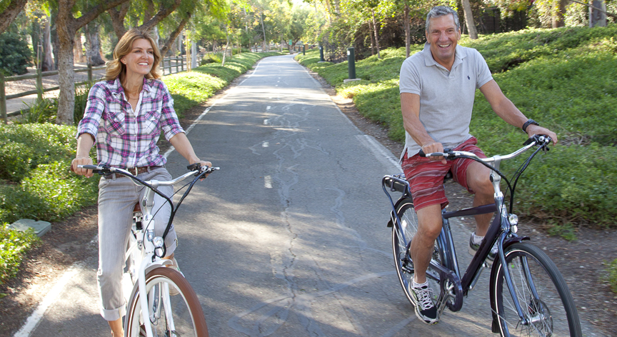 Pedego Couple on Bicycle