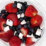 strawberries, blueberries and coconut
